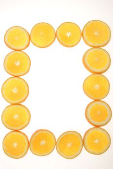 citrus fruits in slices forming a frame