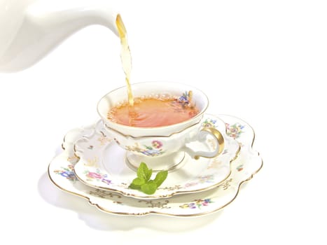Delicate porcelain cup of tea for a refreshing High Tea
