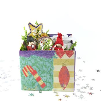 Christmas Festive Season Decorations in a box on a White Background