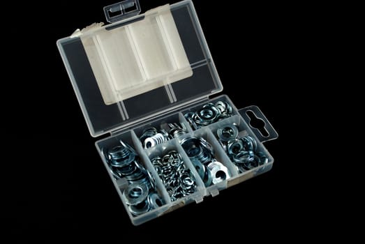 box containing several nuts and washers of different sizes