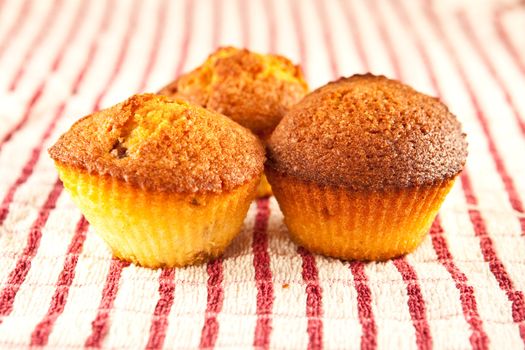 fresh muffins on a cloth