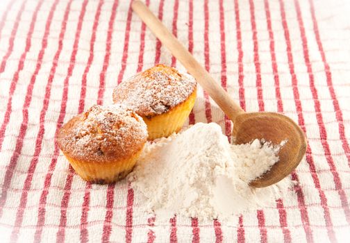 fresh muffins on a cloth