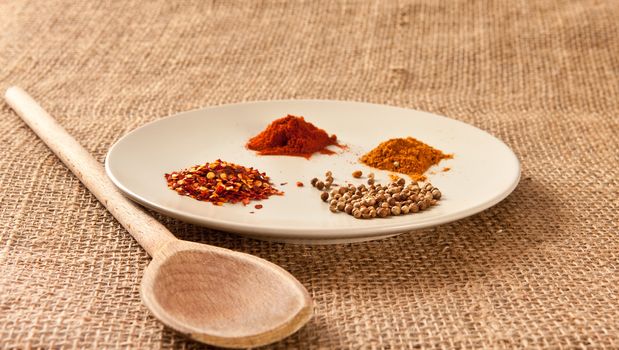 mixed spices on hessian
