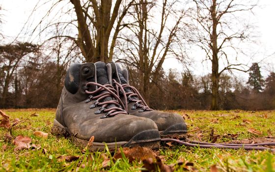 pair of boots in countryside setting