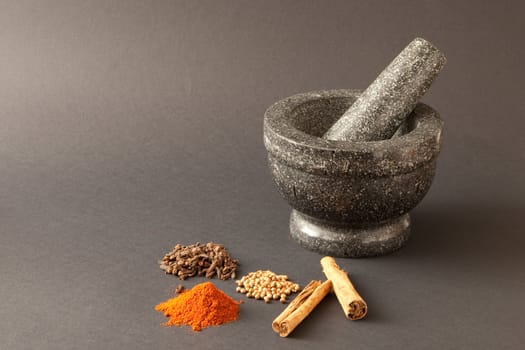 spices on grey background
