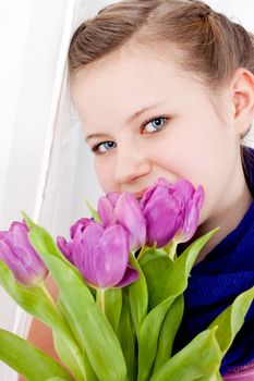 smiling teenager girl with pink tulips bouquet present gift easter mothersday valentine birthday