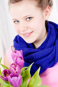 smiling teenager girl with pink tulips bouquet present gift easter mothersday valentine birthday