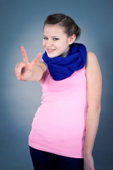 young teenager girl smiling having fun portrait blue scarf