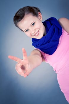young teenager girl smiling having fun portrait blue scarf