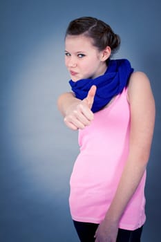 young teenager girl smiling having fun portrait blue scarf