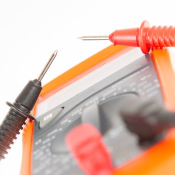 Digital multimeter isolated on a white background