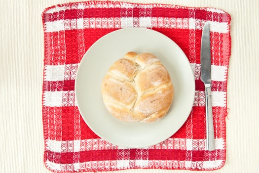 Fresh roll on a plate