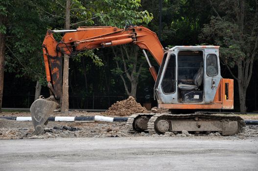 Excavators are heavy construction equipment consisting of a boom, bucket and cab on a rotating platform.