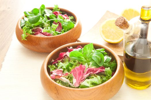 Two bowls of fresh salad