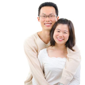 Happy middle aged Asian couple in love. Asian couple smiling isolated on white background.