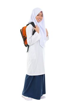 Fullbody Southeast Asian teen in  school uniform with school bag standing over white background