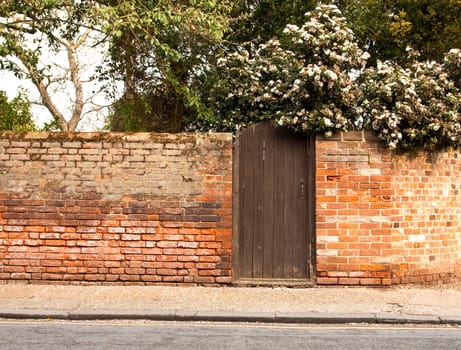 gate in a brick wall