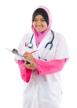 Southeast Asian Muslim medical student. Young medical doctor woman standing isolated on white background.