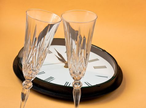 clock with champagne flutes