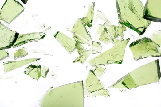 Green shards of glass isolated on white