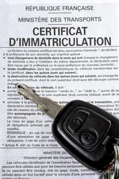 key of car on a certificate of French registration