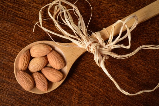Almonds in a Wooden Spoon