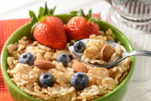 Bowl of Cereal with Strawberries, Blueberries and Almonds