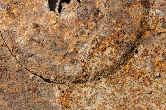 cracked uneven tin with rust stains background