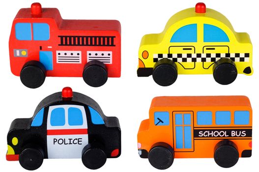 Set of four wooden toy cars.  Red fire truck, yellow taxi cab, black police car, and orange school bus.  Isolated on white.