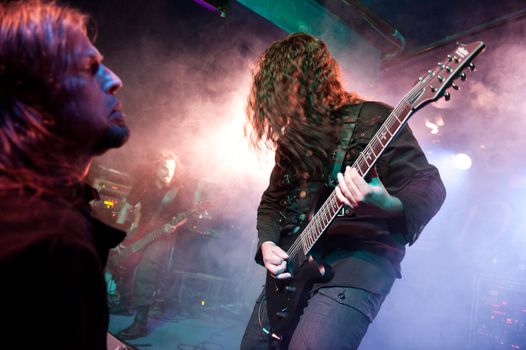 CANARY ISLANDS – DECEMBER 3: Guitarist Ancor Amador from the Spanish band Scandelion with 1 unidentified fan (l) performing during Hard & Heavy Meeting December , 2011 in Canary islands, Spain
