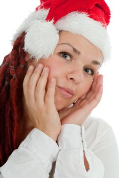 Portrait of young modern girl wearing Santa Claus hat isolated on white background.