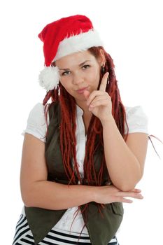 Young modern girl wearing Santa Claus hat isolated on white background.