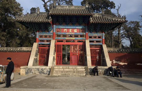 Red Entrance Gate, Mencius Temple, Zocheng, Shandong Province, China
Mencius is considered the first disciple of Confucius.  He died in approximately 300 BC and Chinese living today can trace their genealogy all the way back to Mencius.  Very famous philospher, educator and religious figure in China.

Editor's Note--the Chinese characters on the Gate are not trademarks or logos.  These are the names of the gate.  This is the Star Gate Entrance to the Mencius Temple.