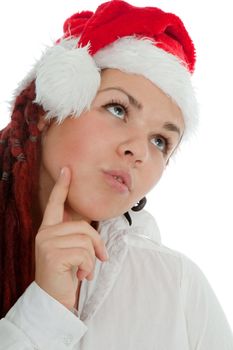 Portrait of young modern girl wearing Santa Claus hat isolated on white background.