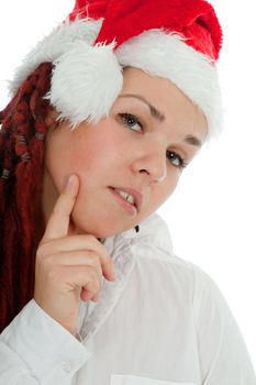 Portrait of young modern girl wearing Santa Claus hat isolated on white background.