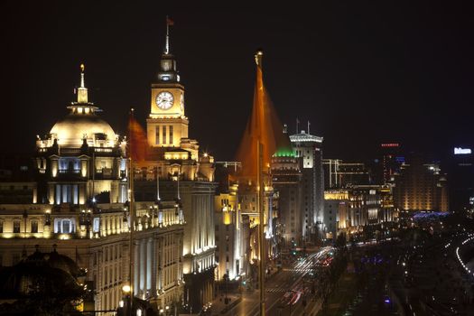 Shanghai China Bund at Night Cars, Flags Trademarks obscured