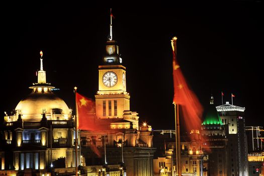 Shanghai China Bund at Night Clock Flags