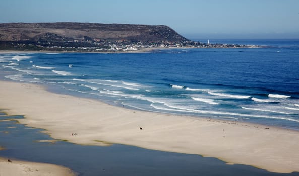 The expanse of Long Beach, with Kommetjie in the background, Cape Peninsula, South Africa.