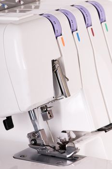 white sewing- machine isolated on white background