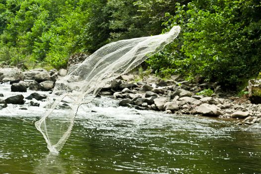 Flying fishnet on the river