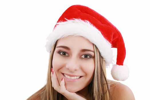 Portrait of beautiful woman wearing santa claus hat on white background