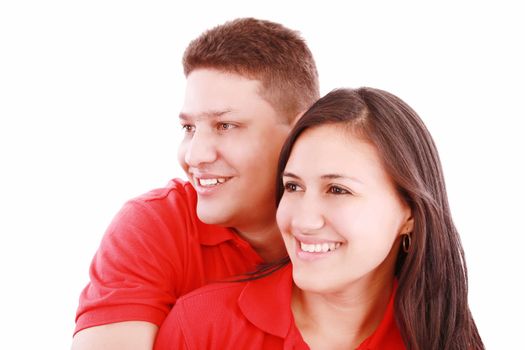 happy young couple smiling looking away, isolated on white