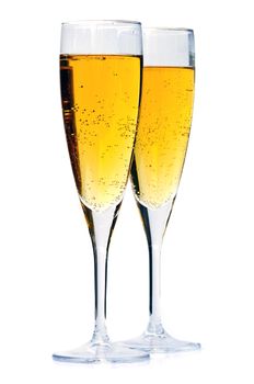 Two full champagne flutes isolated on white background