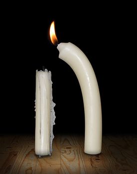 a candle helps another candle with fire
