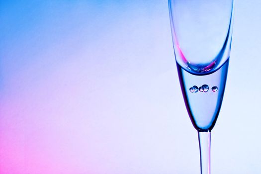 glass for champagne  on blue and red background