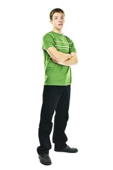 Serious young man standing full body with arms crossed isolated on white background