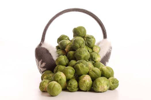 Brussels sprouts in a studio setting over white