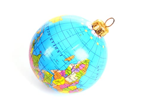 Earth camouflaged as a Christmas ball over white