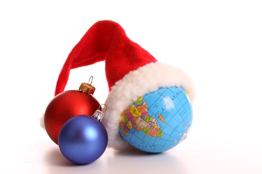Christmas balls and Santa's on a white background