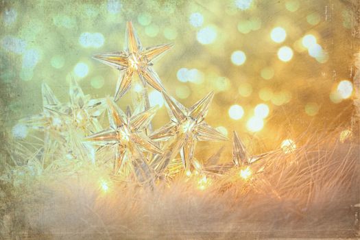 Vintage holiday lights with sparkle background